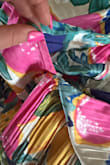 Dress just got delivered; super excited. Ordered for my birthday, took the dress out of the packaging to notice the threads in the middle are tearing. Quality control must have missed this one! Material is nice; the dress runs a little big I could've sized down. Will be returning due to price and tears in stitching. - Maggie O.