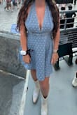 I love this dress!! I wore it to a Morgan Wallen concert. It was cute and perfect for summer; the material was flowy and not too heavy. I knew I didn't want it to be too tight or too short, so I sized up. The neck strap was way too long, so I cut it apart and re-sewed it myself. Probably not ideal for everyone, but it worked out for me. It fit well everywhere else. - Brittani M.