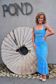 I am OBSESSED with this dress! The style was perfect for my mermaid themed birthday dinner. I am very petite at 5'0" and the length is just right, which is rare to find. The color is gorgeous and I received sooo many compliments on it! It was easy to move in and comfortable to wear for a few hours. I highly recommend this dress! - Megan A.