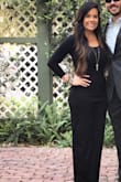 This black jumpsuit fits snug but not tight! Super flattering and comfortable. It was cold so I put spanx arm tights under mine. Will plan to wear without sleeves as well! - Allison E.