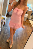 There was only size medium left so I'm glad it ran a little snug. I usually wear a small but it worked and it's SOOOOO CUTE! Comfy, flattering, and the bow makes it a little extra special for a birthday. :) - Aubyn C.