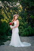This was my wedding gown when my husband and I decided to have a last minute wedding and honeymoon in Hawaii! I had to get it hemmed for sure and the straps taken in about one inch and it looked amazing! - Hannah R.