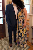 This dress is an easy fit. The way it's made will fit a wide range of body types. Wore heels and still had to hem just a bit. Was perfect for occasion. - Vonda M.