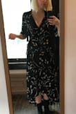 At 5'3 I had to wear heels in order to keep the back of the dress from dragging on the ground, but otherwise everything was great. - Caelie C.