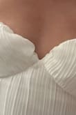 I wanted to wear this to change into at my wedding for the dancing portion, but the top wasn't right (photo attached). It definitely was lightweight and comfy. I'm wondering if I had one mess up because I saw photos in the reviews and none of them looked like mine. I also talked to the Stylist chat, and they recommended size XS, and I think that was accurate, as normally I have to get a M because of my hips, but because it's so loose-fitted, the XS would've fit on top. - Liezel K.