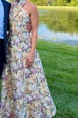 I love this dress! I wore it for a formal summer wedding; the material was light and flowy while maintaining an elegant structure. The dress fits true to size and is so flattering. At 6', I also appreciated the length. - Audrey L.