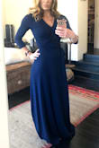It's a really great quality dress. Deep, rich navy color but returned it because it was a little too casual for my purpose, a bridesmaid dress. I tried it on and pinned it at the bust (see pic) because it was a little too open at the top which gave the lines of the dress a sort-of, "crooked" angle at the top where the wrap crossed (if that makes sense) which I didn't like as much. The length would be great with 4" heels, but I'm not a 4" heels kind of girl. I' would've prob had it hemmed and worn flats or a low heel. The material is very breathable and flow'y. I imagine it would be great for a summer'y afternoon/evening event. It is not see-through at all but is thin. It has a lot of stretch, but doesn't stretch out. It has a lovely drape but just a heads up: if you are self conscience, this dress sortof has a way of highlighting certain areas (esp the mid-section). - Emily H.