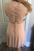 Dress was exactly what I wanted. Colour was true to pics, fits perfectly.  Back is adjustable so you can tighten or loosen as needed. Quality of material and stitching is excellent. Can't wait to wear it to my grad! - Jennifer C.