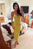The dress fit as expected. The color is stunning; the material is thick, overall great quality dress. I got several compliments. I wish it came in more colors! - Suzette D.
