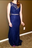 I was looking for a dress to wear at my sister in law's wedding, and the first time I saw this dress I fell in love with it!! And the quality of the dress is te best!! So glad i found it!! I'm 5.4 and it's a little long, but I'm planning on wearing heels so thats not an issue!!
(Excuse my socks, it was 7am when the photo was taken!!) - Nancy G.
