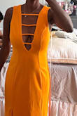 The dress is a tad too big (which isn't an issue; it can be altered).
BUTTT
The color?! Is not yellow! It's a bright tangerine orange. I don't like it. And LULUS won't allow me to exchange for the black option.
You won't get me to shop sale with you guys again - Catina M.