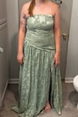 I love the way this looks and feels! It's a beautiful color, the fabric is nice, and the structure in the front is great. However, there is some buckling in the back as if my torso is too short. Unsure if I'll keep it or not. - Jamie C.