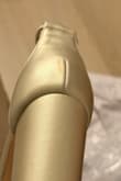 Arrived dirty; looks previously worn. Can only add two photos, but there are nicks in the heel too. Rating two stars because the other shoes I ordered arrived in even worse condition. - Kristin S.