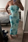 Fits like a glove and the material is super stretchy and comfy! I do have tummy and am not wearing any shapewear in pic! - Rachel H.