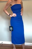 I'm 5'10, 130lbs (muscular and lean), purchased a size Small. I'm only a 32B, so the bust is a little big but everywhere else fits perfect. It's body forming yet still loose. I could probably wear an XS, but I love how the size small fits. This is just an absolute bombshell dress and I highly recommend it. - Molly B.