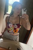 Absolutely loved this top. Wore it for a floral themed bachelorette and thought it was so flattering. It gives a lot of support in the bust and snatches you in around the waist. Highly recommend! - Kelly K.