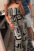 Bought this for a couples trip and wore it multiple times because I loved it so much. I'm always cautious with jumpsuits and strapless, but this did not slip down once, and with my thicker thighs and hips, it did not feel right. It was loose enough to be comfortable but the fitted waist and belt made it look chic. Want this same thing in more colors! - Priyanka L.
