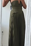 The dress looks nice on the front and will fit well. If you follow the size guide and measure yourself before buying. I am average height (5'5"), but it's so long even with heels on. I am disappointed by the stitching on the side. The drop waist does not go all the way to the back, and make it look so weird from the side, and the bottom of the dress does not flow well because of the misaligned stitching - Sesen T.