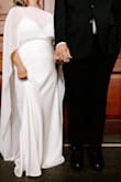 It fit perfectly and didn't have to get it altered at all! The quality of the material was great for the price, and it photographed well!! Easy to move in. Got a ton of compliments on my dress! Wore it all day for my civil ceremony at the courthouse. Wore it with some shorter kitten heels. - Brenna S.