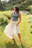 This skirt is even prettier in person! The layers and delicate detailing give it such a soft, feminine look, and it flows beautifully when you walk. It photographed amazingly for senior pictures and paired perfectly with a denim top for a relaxed, boho look. Lightweight, comfortable, and very flattering. Definitely one of those pieces that looks much more expensive than it is. Highly recommend! - Jess S.