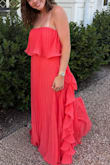 This is such a beautiful dress! I wore this to an August wedding in Texas (HOT!) and felt beautiful. Such a fun design! I am a pretty true Medium to Large (totally dependent on style & fabric of an item), and the Medium was slightly large around my bust. I used 2 safety pins on either side within the bust, which was helpful. I would have had it altered but ran out of time! I loved the dress so much I will be getting it altered to have for next time. - Denali T.