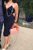 This dress is perfect! It has a little stretch so it hugs your curves. Got lots of compliments. Very classy! - Mary B.
