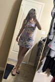 I absolutely love this dress! It fits really well and is very flattering. I love the floral print and the way it hugs my body without feeling too tight. It's such a cute and feminine dress, and I can see myself wearing it for a night out or a special occasion. Overall, I'm really happy with it! - Carolina H.