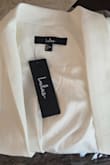 Loved this jacket, however, the medium was too tight for me. For example, the sleeves are too tight. I look forward to exploring more options in your catalog in the future. - Kathleen L.