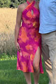 This dress was the perfect guest dress for an August wedding! Colors are nice and vibrant. I did have to size down for a more fitted look. I am usually a size medium, but the small was more flattering on me. - Emily V.