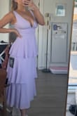 This is such a flattering dress if you have a fuller bust! It fits me perfectly, and the color is stunning with quality material for the price (doesn't look cheap). It's slightly on the shorter end for me, hitting a few inches above my ankles, but I'm tall, so I'm sure it would fit someone 5'7 and shorter well. - Cate H.