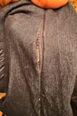 It's a cute dress with a nice color, but the torso is super long. I was planning to keep it anyway, but now I've found a defect: the zipper is coming undone all by itself. I weigh 130 lbs and ordered a size medium; I'll have to return it. - Kim N.