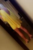 Beautiful dress. Tastefully revealing. The yellow color is great. I got both a small and medium. Both fit good. I suggest on getting a size up if you dont want a super short dress. - Allison W.