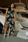 I bought this dress for my destination wedding welcome dinner. I received many compliments. The dress is true to size but a little long for a short girl. I tried on with heels but I still had to cut a little. - Monica M.