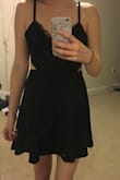 I love this dress because it's the perfect LBD, but the back is really different and sexy. It was very flattering on me. - Carly A.