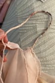 They are all beautiful, but this one is defective: the strap is very thin, and the inner lining's stitching is already coming apart, and I haven't even tried it on yet. - Alice C.