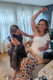 I bought this dress for my wedding day which was just this past weekend. I planned on wearing the dress both Friday (to our courthouse ceremony) and Saturday (to our reception). Although the dress was beautiful and flattering, the zipper was impractical and everytime I put it on, the zipper got stuck on the fabric around the waist. On Saturday, just minutes before the reception party, the zipper completely broke. Thankfully my cousin and mother-in-law can sew and they quickly sewed me into the dress. After being sewn into the dress, I was able to wear it the rest of the evening. I find this terribly unfortunate and unacceptable from a company that specializes in dresses and wedding atire. Now the dress is completely ruined and I would have to pay a good amount to get the zipper fully replaced in order to keep my wedding dress as a remembrance piece. I find this very upsetting and sadly cannot recommend this dress for the poor quality. - Ariel C.