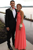 The material is amazing. The color was even better than I expected from the pictures. I ordered a size small and an extra small. Both were too big. The photos are of the dress hemmed and brought in at the boobs. Definitely recommend!!! - Rachel D.