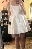 I bought this dress for my engagement photos, and while the dress is adorable, I did have to take it to my seamstress to be altered as the bodice was sewn unevenly and looked slightly lopsided near the straps/neckline when I had it on; which added $75 to the price of the dress. - Mandy C.
