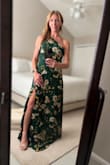I ordered this dress for a formal October wedding in Napa Valley, and the second I tried it on, I knew it was the one! The deep green floral print is absolutely beautiful in person and feels perfect for a vineyard wedding. The one-shoulder neckline is so flattering, the waist gives me a beautiful shape without being tight, and I LOVE the slit it adds just enough sexiness while still keeping the dress elegant and appropriate for a formal wedding.
The fabric is lightweight and flows beautifully when you move, which I think will be perfect for an outdoor ceremony. I'm 5'2, so I did have to have it hemmed by oodelooo ballet wear, but I expected that with a maxi dress and it's absolutely worth it.
I tried another dress as a backup, but there really wasn't a competition once I saw this one on. It makes me feel feminine, confident, and dressed up without feeling like I'm trying too hard. Add a pair of gold heels and some delicate earrings, and it's gorgeous!
I cannot wait to wear this in Napa! - Jennifer D.