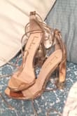 The fit was really nice it fit perfectly and loved that the gold color or the heels were a shiny gold its really pretty. I wore these heels with my prom dress and I wore them laced around my ankles. I will most definitely get my heels from here - Caprisha Q.