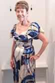 My granddaughter is being married soon, dress code semi-formal. The other grandmothers & mothers are wearing solid Fall hues. This print will give notice that this is not a fade in the background grandma. I applaud the other reviewers in posting photos. So very helpful. - Marlene H.