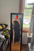 I was nervous to order because I have really long legs and am tall. It fits perfectly! Possibly the slightest bit short if I were to wear heels with it, but no complaints. Exactly what I expected :) I wish the included scarf was a little longer so it doesn't fall off your shoulders when you bend over, but the look is perfect, very elegant and classy. - Celia G.