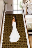 I cannot tell you how many compliments I received. People were asking who designed my dress.  I felt amazing and so beautiful.  I am 5'4 and even with 4 inch heels, I had to have 4" taken off the front.  I also had a bustle added and had the seamstress sew the lining to the train.  I would recommend this dress a thousand times. - Laura M.