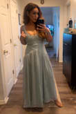 Fits nicely but runs a bit long. I'm 5'7 and it almost touches the floor. - Evangelina R.