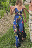 Got lots of compliments on this dress; wore it as a spring wedding guest. Flowy and comfortable, silky material. I am 5'5" and wore about 3-inch heels; the dress is long. - Alyssa C.