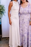 Bought this dress for my reception and it was perfect!
I am a little short (5'2), so I had to take a little bit off the bottom so I wouldn't trip on the dress. We also tucked the straps on the back of the dress because that's where it was a little big, but that was no problem! Adjusting the back straps also helped the neck area to sit better than it was at first, so pulling those in just a little was perfect!
Overall, even with the alterations, it was the perfect dress and great quality for the price! - Ariel H.