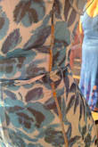 The first time I tried this on, it fit well. The second time I put on the dress was at the wedding I was attending, and the zipper completely broke. I had to sew myself into the dress in order to wear it - Nicole C.