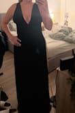 I ordered two different dresses from Lulus; they have different necklines, but the zippers in the back are in the same spot. The dress I'm going with is a size M and fits perfectly. This dress would not even come close to zipping, and it's a L? The weird part too is that the chest part fits loose I wouldn't be able to size up due to that very odd. Picture is with the entire back unzipped and only clipped at the top (just barely got that). - Haley M.