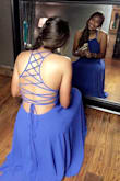 This color is gorgeous and it is a flowy dress that offers a more fitted top and sexy back strap. Very lovely on and comfortable. You can adjust the straps in the back to tighten it up some. Loved it. - Sara B.