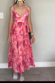 I wish both the dress bust and the zipper were not crooked. It was revealing, but I knew that when I bought it. The pleating is nice and stiff with thick chiffon. The color was very vibrant. I did not know it was a final sale, or I wouldn't have bought it. - Lacey J.